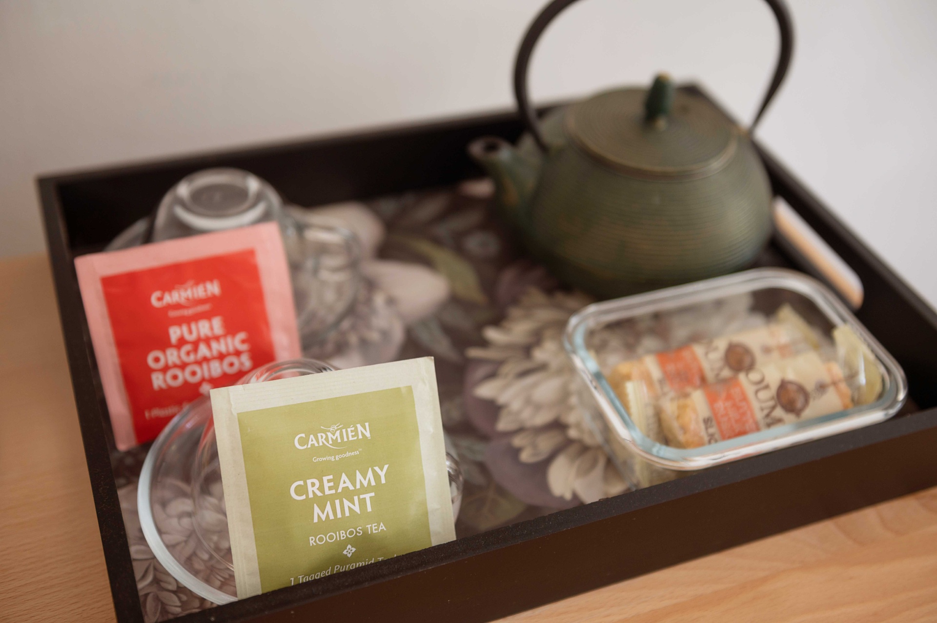 Welcome tea tray with rooibos, teapot and rusks